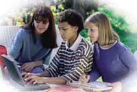 three teens at computer